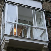Утепление балкона с выносом и французскими окнами фото