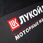 Печаль логотипов на спец одежде фото