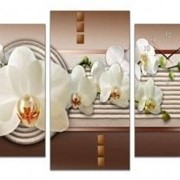 Трёхпанельная модульная картина с часами 65 х 85 см Ванильные орхидеи на кофейном фоне с узором фотография