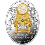 Яйца Фаберже. Яйцо-часы “Vacheron Constantin“ серебряная монета в деревянном футляре фото