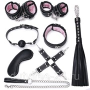 Пикантный черно-розовый набор БДСМ: маска, ошейник, кляп, фиксатор, наручники, оковы, плеть фотография