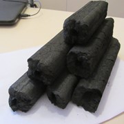 Обожженый брикет древесно-угольный фотография